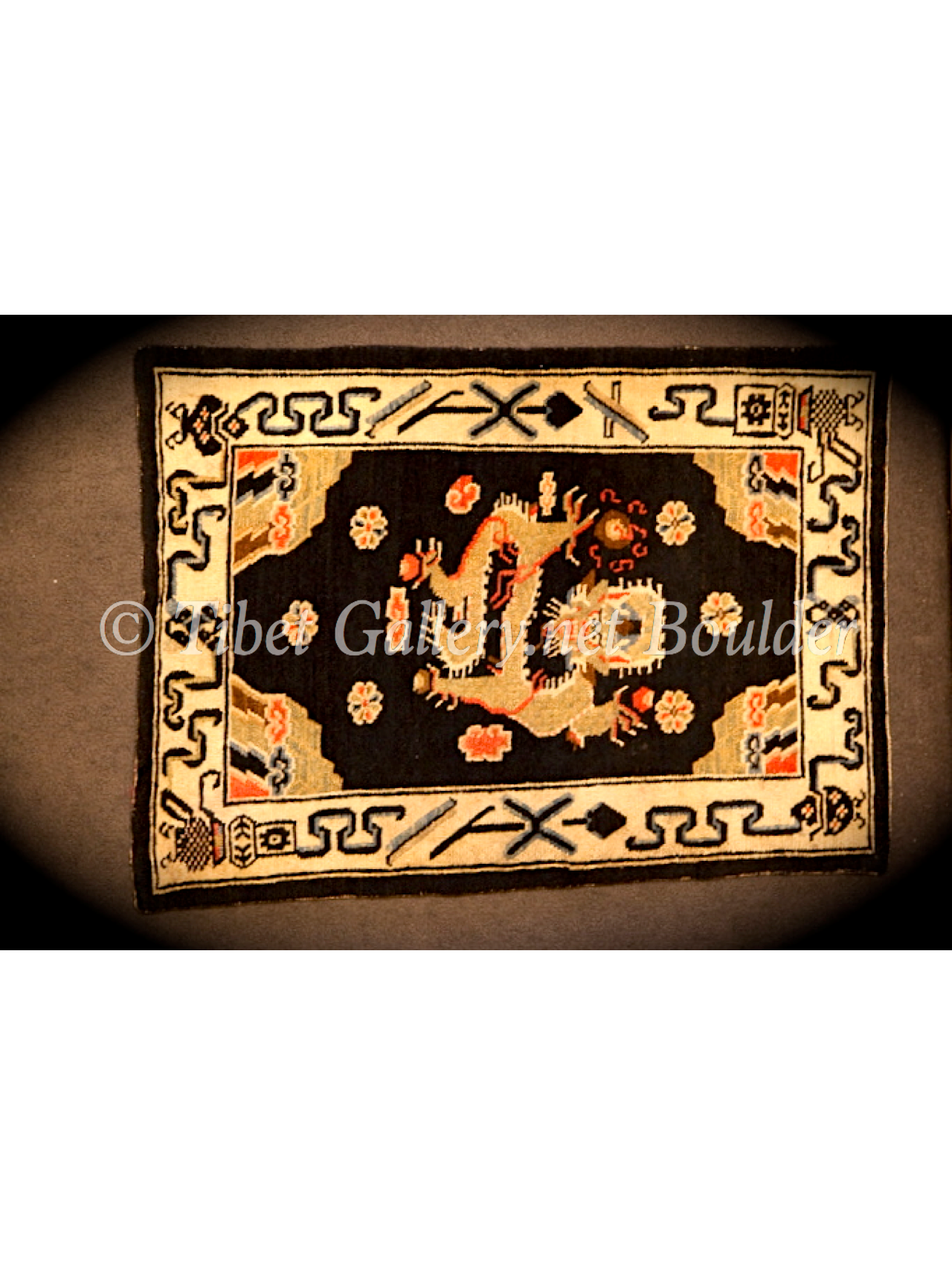 Antique Tibetan dragon rug (18thC)